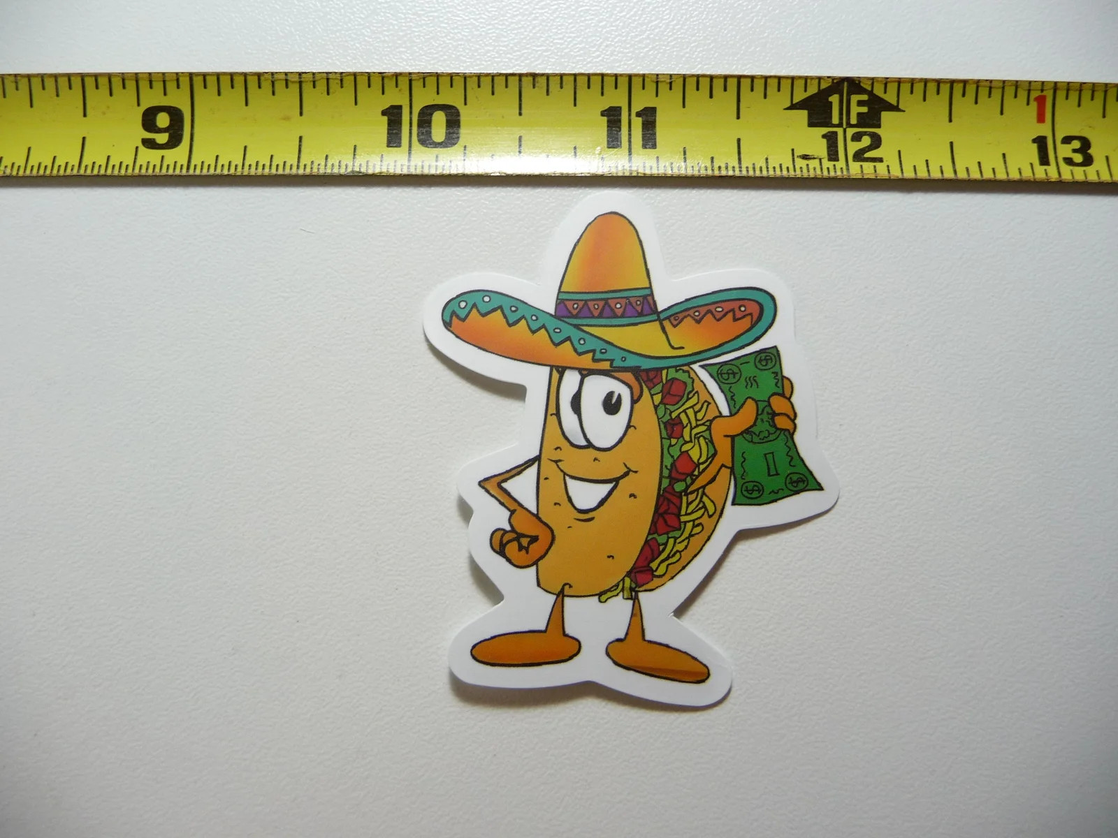 TACO HOLDING DOLLAR BILL SMALL STICKER DECAL MEXICAN FOOD MEXICO FUNNY