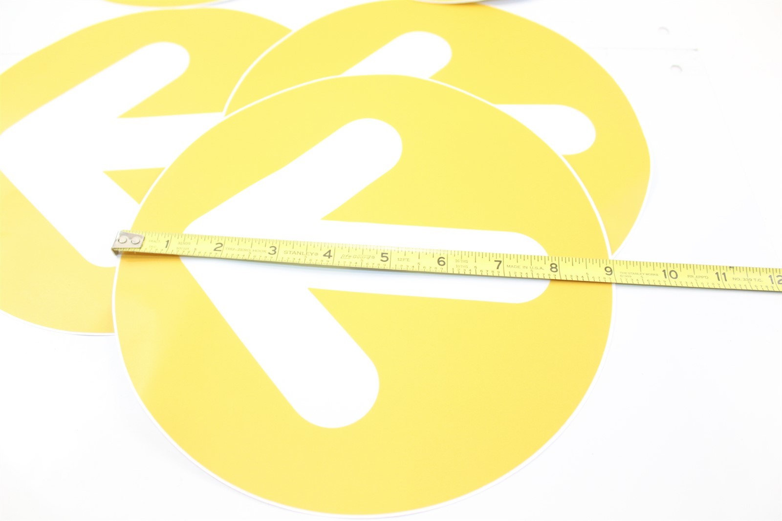 Directional Sticker Packet Yellow with White Arrows 9″ Diameter Set of 5