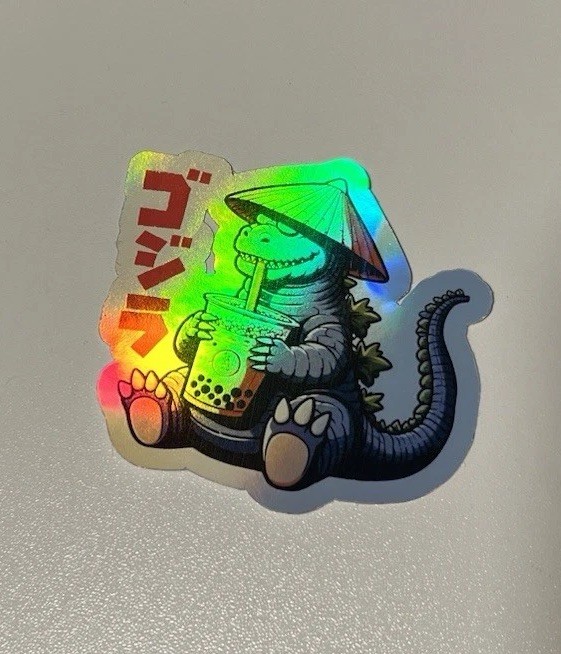 Godzilla drinking a boba tea 3 Inch Waterproof Vinyl Holographic Sticker