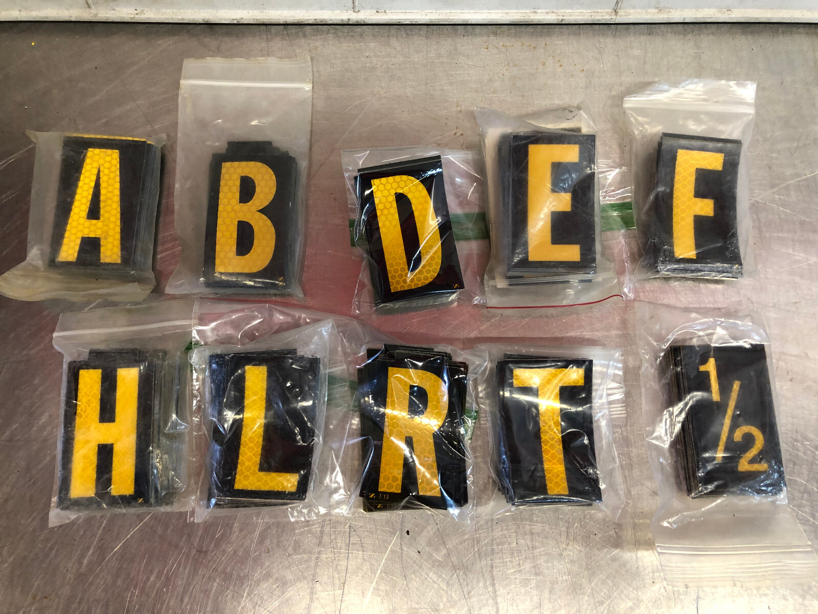ELECTROMARK or 3M Reflective 2.5″ Yellow on Black Letters or Numbers – 25 Count