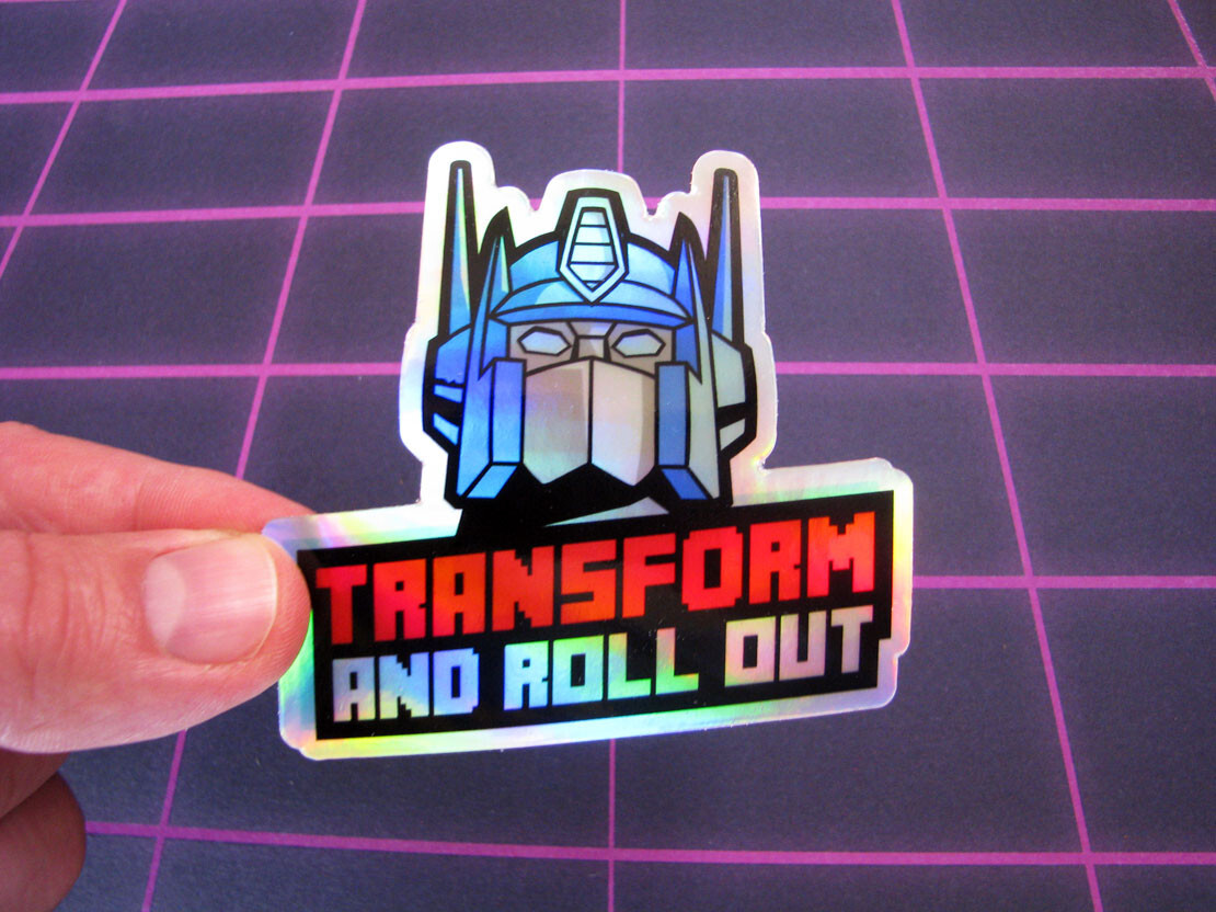 “Roll Out” Holographic Sticker Metallic Robot Laptop Skateboard Decal