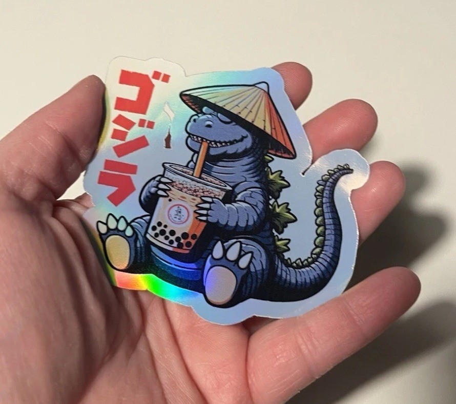Godzilla drinking a boba tea 3 Inch Waterproof Vinyl Holographic Sticker