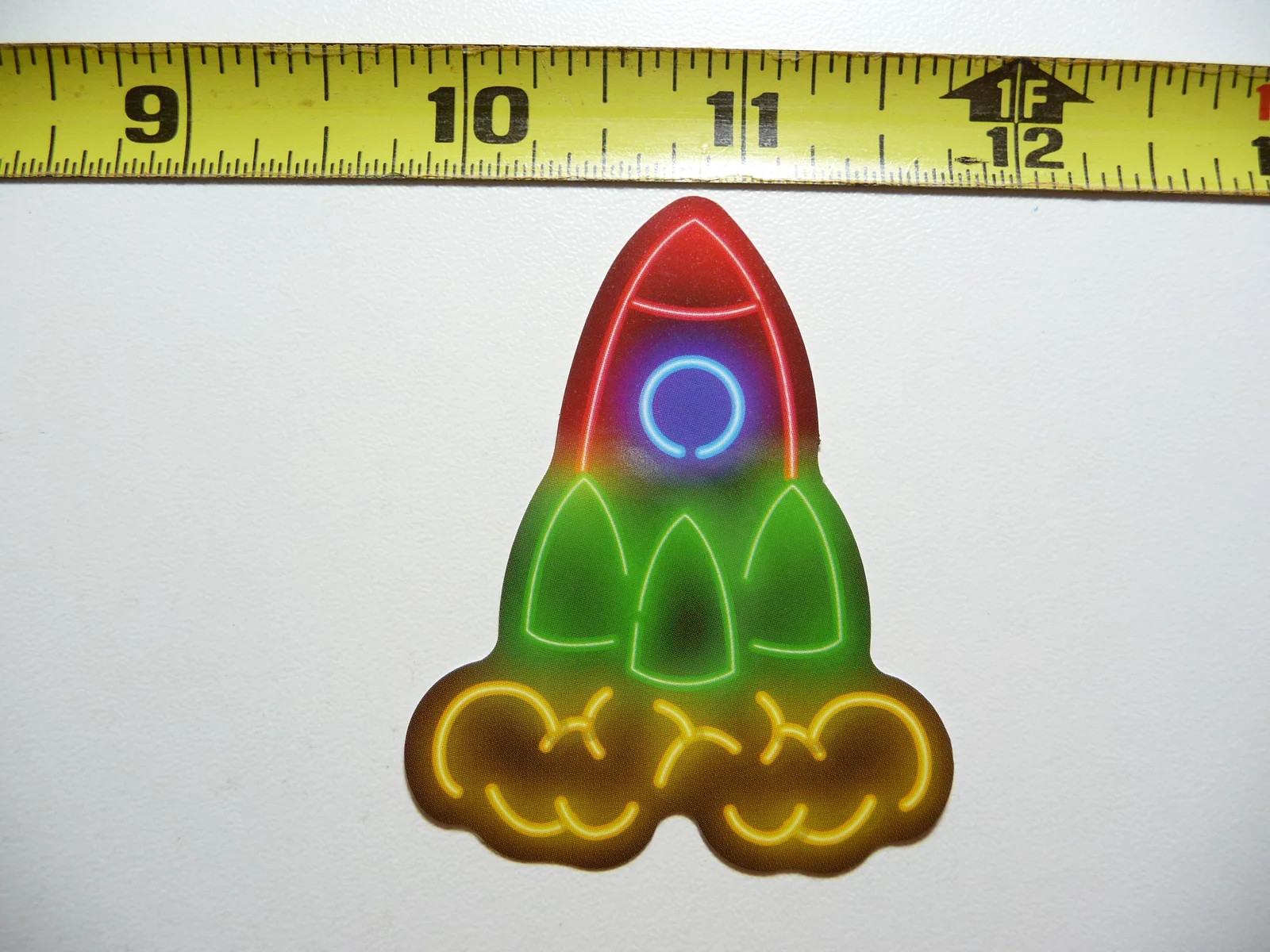 ROCKET SHIP BLAST OFF EXHAUST SMALL STICKER DECAL NEON STYLE FUN PLAYFUL
