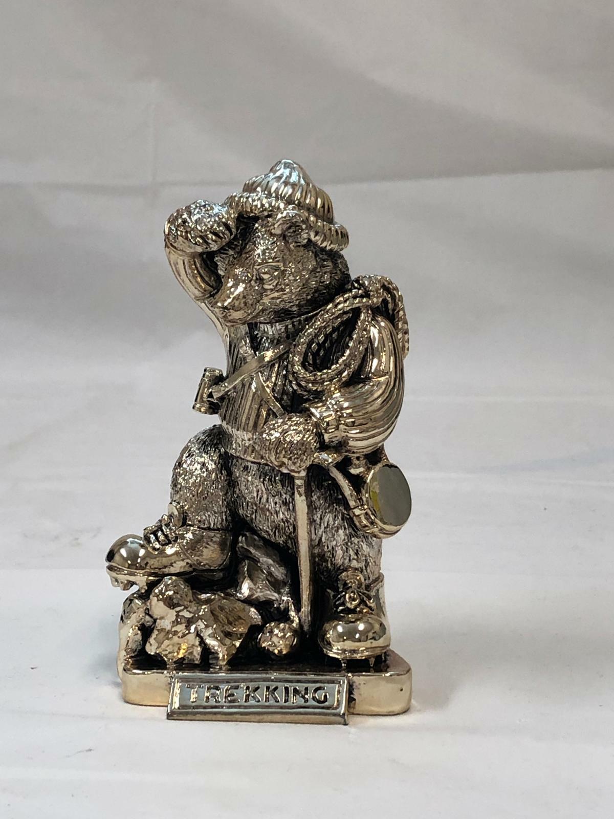 SILVER BEAR ART DECOR with title TREKKING