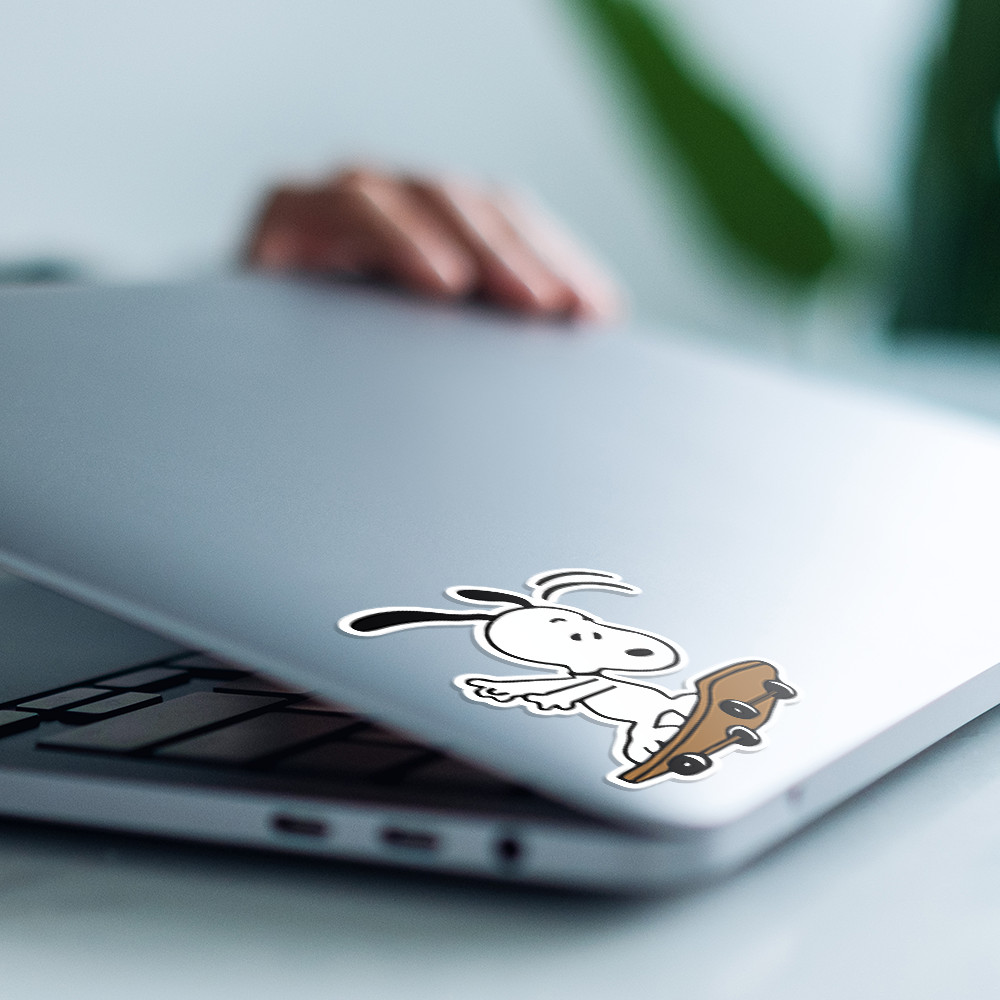 Peanuts Snoopy playing with a skateboard, cute and fun sticker 4″W x 4.5″H
