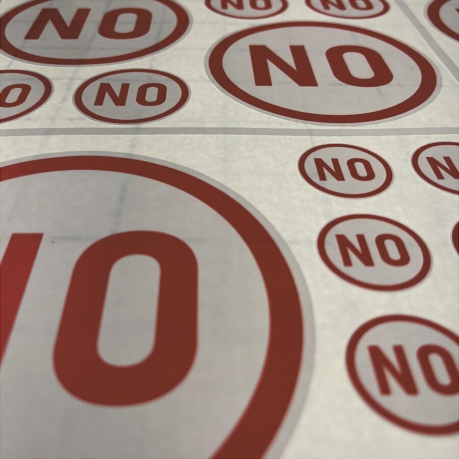 $0.99- 21 Pack of “NO” self adhesive vinyl stickers for what not and what have u