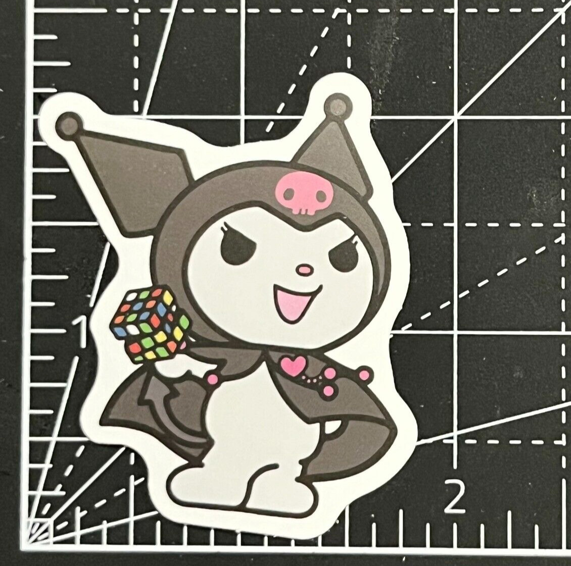 Kuromi Cuber Holds Rubic’s Cube 80’s Retro – Vinyl Decal Sticker Bomb Waterproof