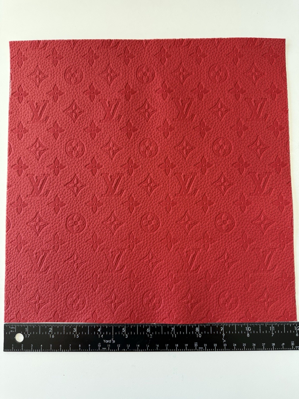 LV Red Embossed Monogram Vinyl for Crafting Classic Size piece 12″ X 12″ Scrap