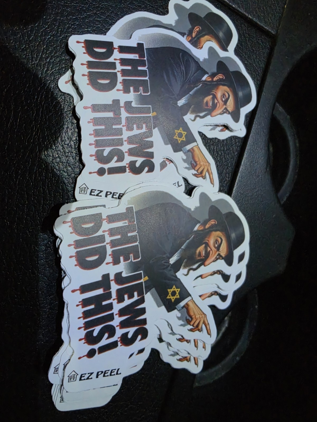 “The Jews Did This!” Gas Pump Stickers