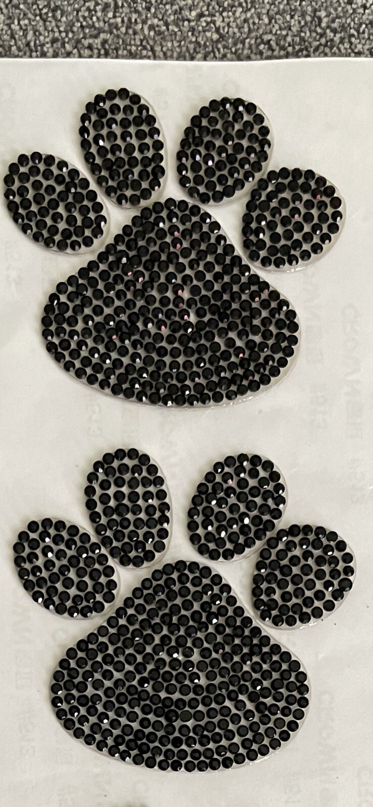 New in package paw print black Chrystal decal multi use 1/2 x 1 3/4 in set of 2