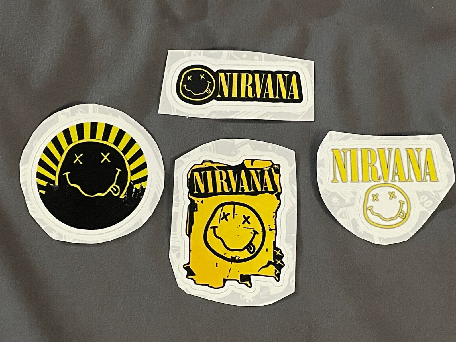 Lot of (4) Nirvana KURT COBAIN 3/4″ to 2 1/4″ Band Logo STICKERS Fast! FREE SHIP